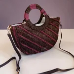 Bolso de mano de rafia marrón y fucsia con asa circular y bandolera para mujer