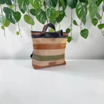 Mochila multicolor para mujer en beige, negro, marrón y verde