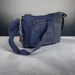 Bolso bandolera azul marino de nylon acolchado para mujer con bolsillos