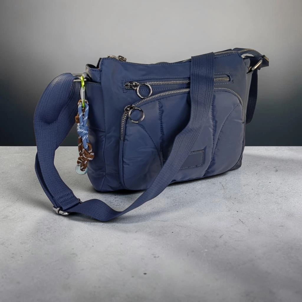 Bolso bandolera azul marino de nylon acolchado para mujer con bolsillos