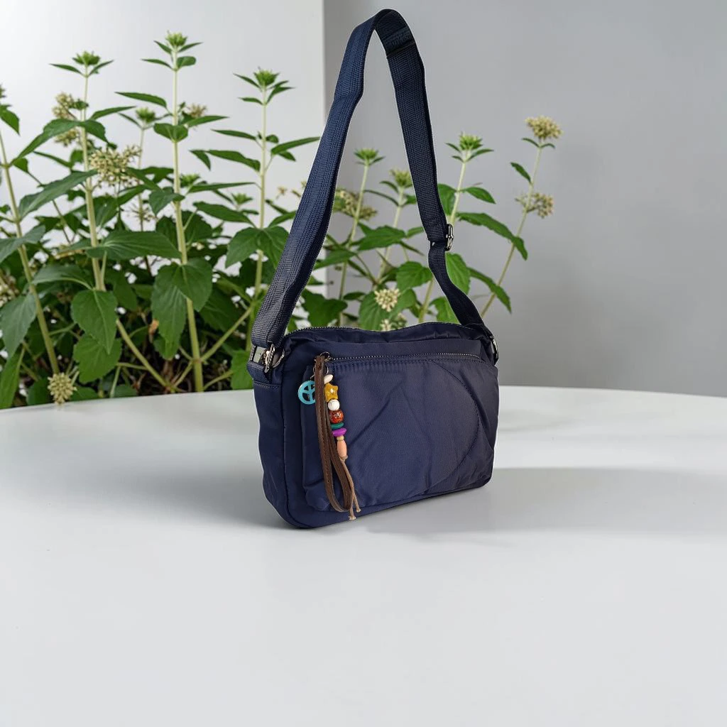 Bolso bandolera azul marino de nylon acolchado para mujer con bolsillos